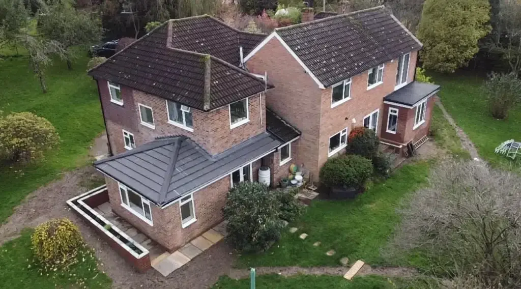 Brick house with modern rear extension