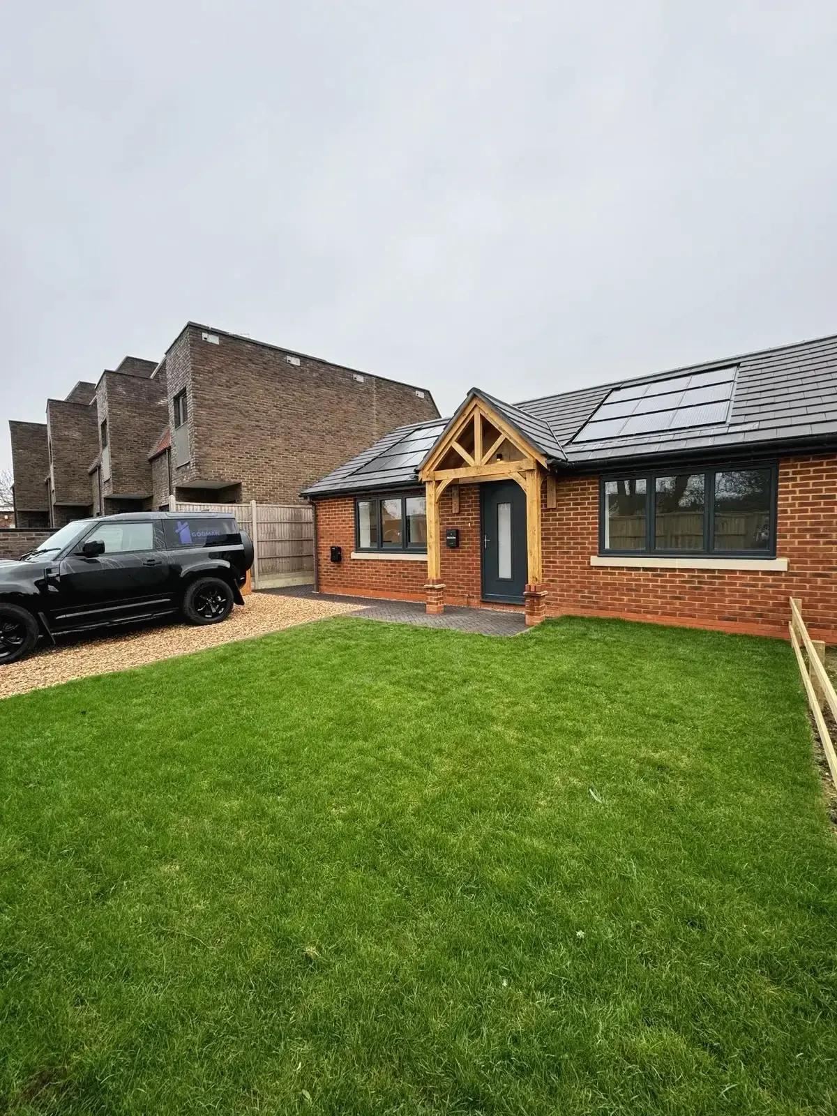 Energy-efficient new build with solar panels and contemporary brickwork design
