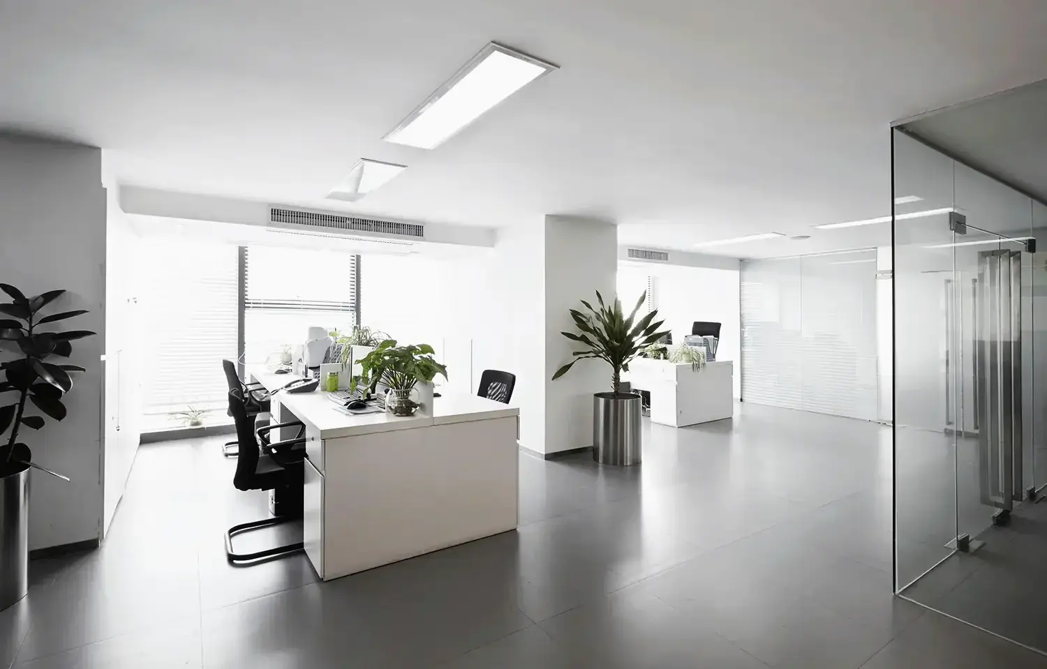 Modern commercial office interior with glass walls